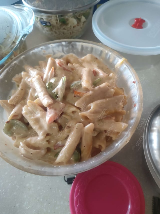 Delicious Ravioli in Pink Sauce prepared by COOX