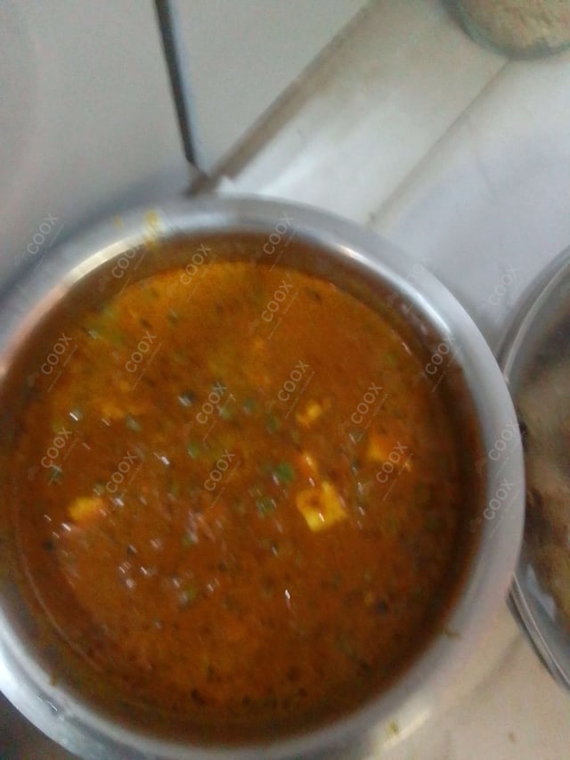 Delicious Matar Paneer prepared by COOX