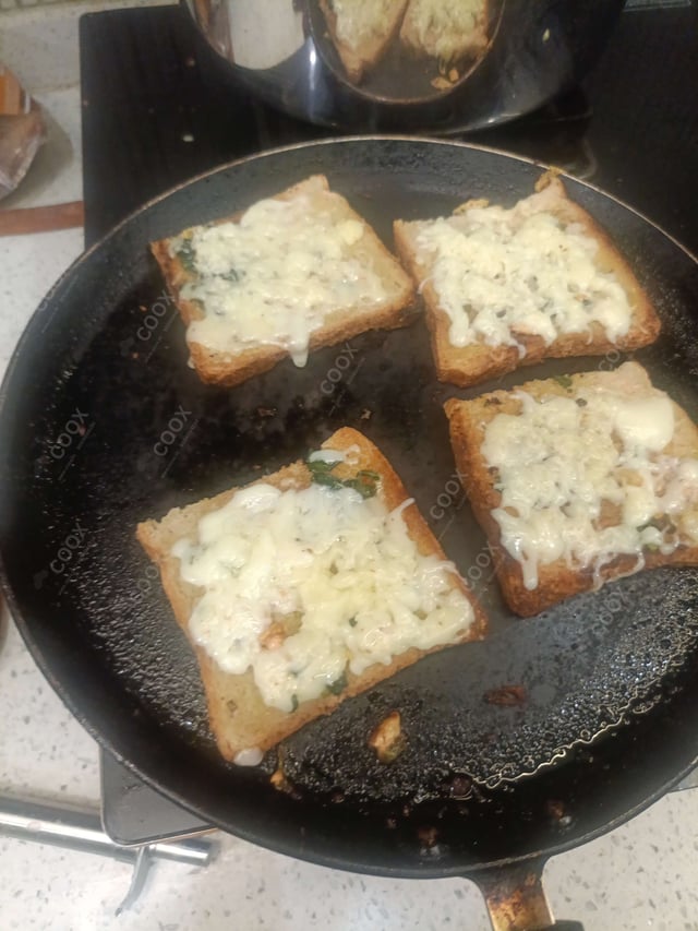 Delicious Garlic Bread with Cheese prepared by COOX
