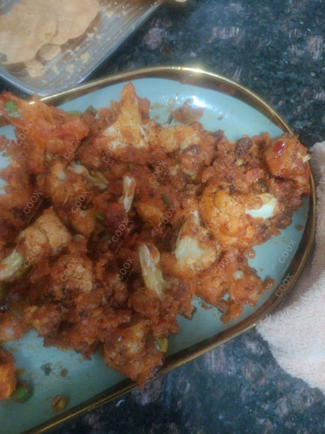 Delicious Honey Chilli Potato prepared by COOX