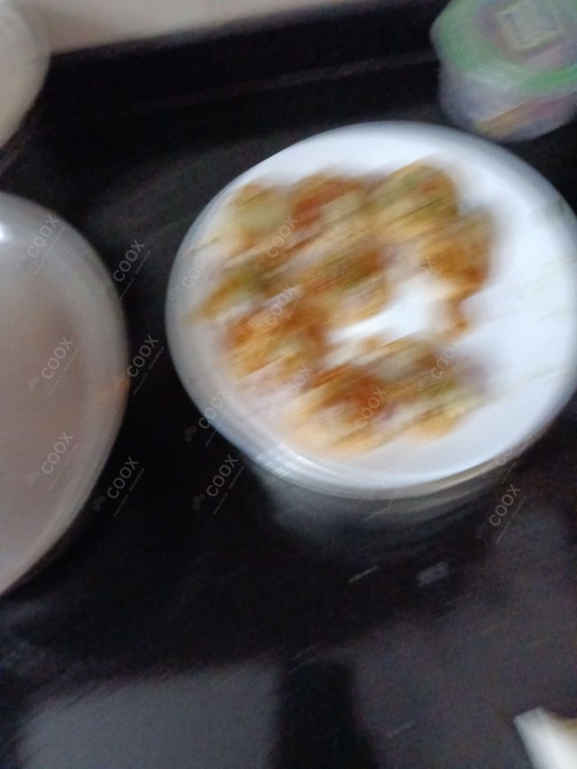 Delicious Bhel Puri prepared by COOX
