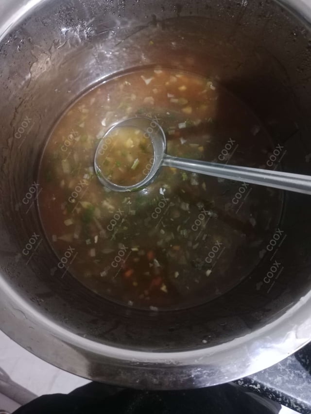 Delicious Vegetable Manchow Soup prepared by COOX