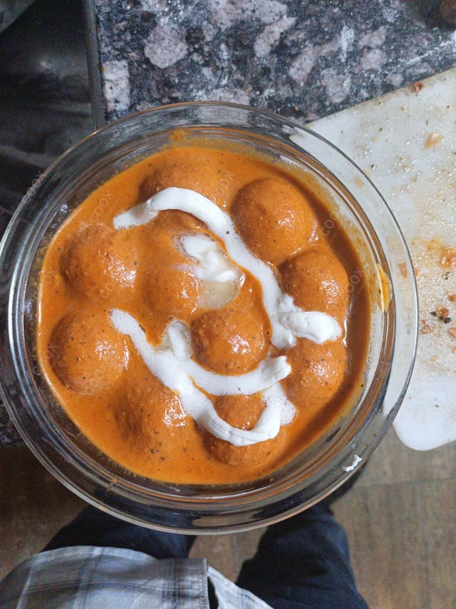 Delicious Malai Kofta (Orange Gravy) prepared by COOX