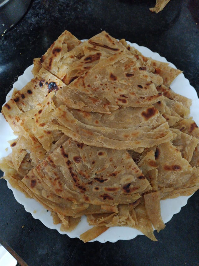 Delicious Lachha Paranthas prepared by COOX