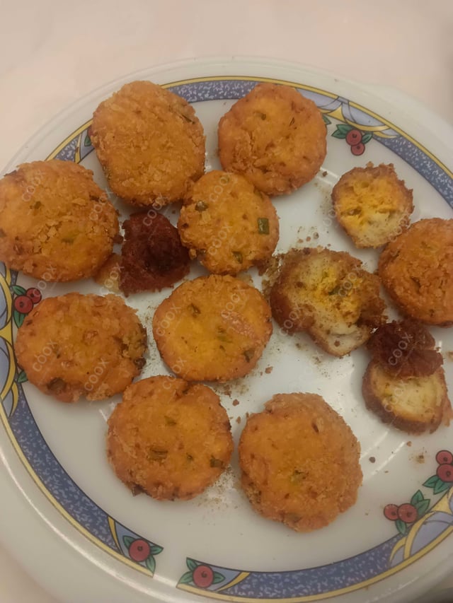 Delicious Dahi ke Sholey prepared by COOX