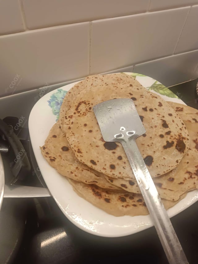 Delicious Lachha Paranthas prepared by COOX