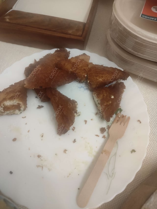 Delicious Dahi ke Sholey prepared by COOX