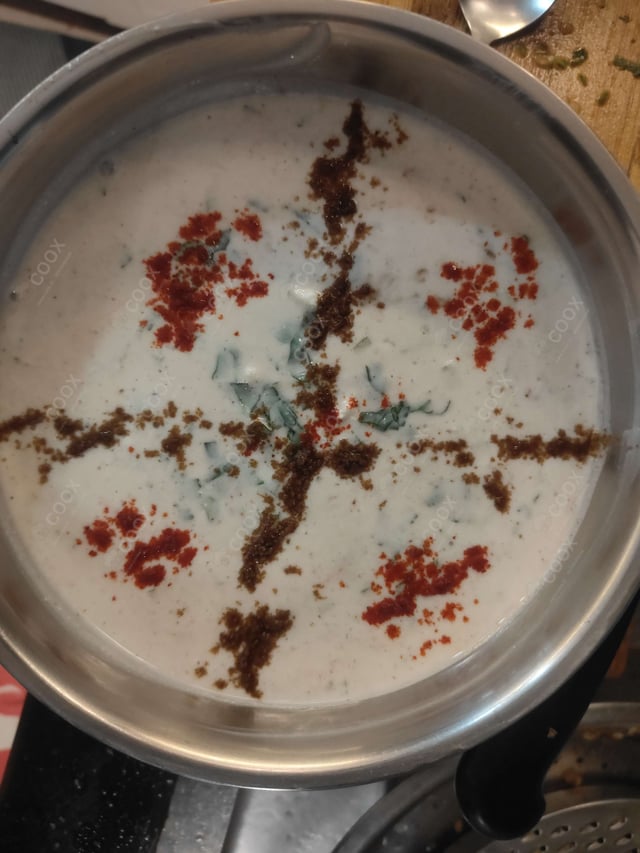 Delicious Cucumber Raita prepared by COOX