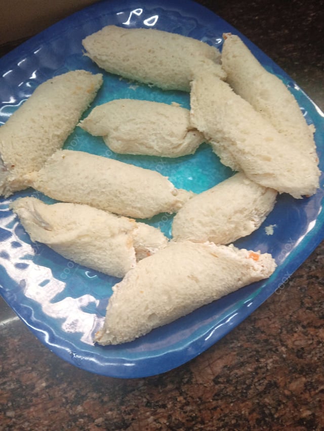 Delicious Dahi ke Sholey prepared by COOX