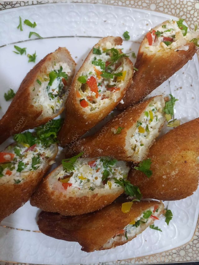 Delicious Dahi ke Sholey prepared by COOX