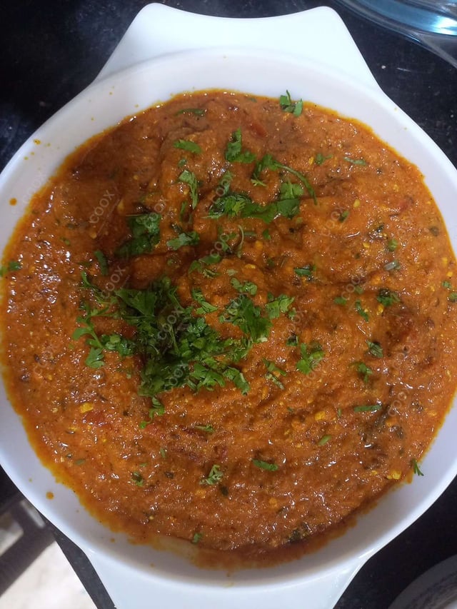 Delicious Dum Aloo prepared by COOX