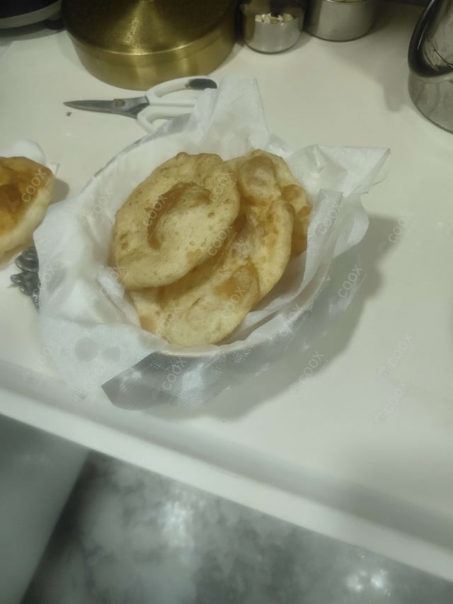 Delicious Chana Bhatura prepared by COOX