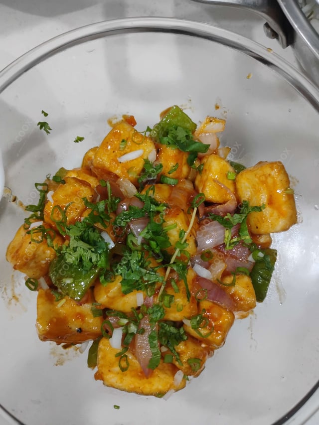 Delicious Chilli Paneer (Dry) prepared by COOX