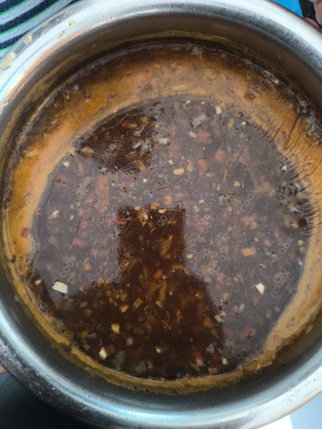 Delicious Vegetable Manchow Soup prepared by COOX