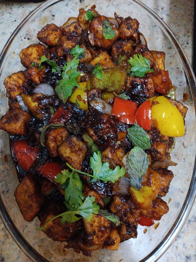 Delicious Dahi Bhalla prepared by COOX