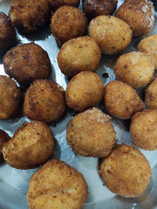 Delicious Dahi ke Sholey prepared by COOX