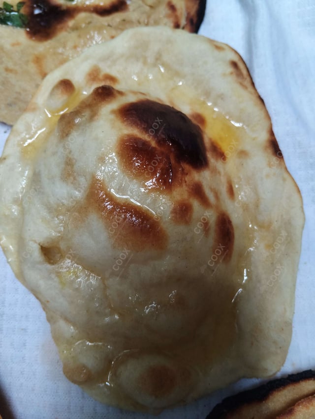 Delicious Naan (Butter / Garlic) prepared by COOX