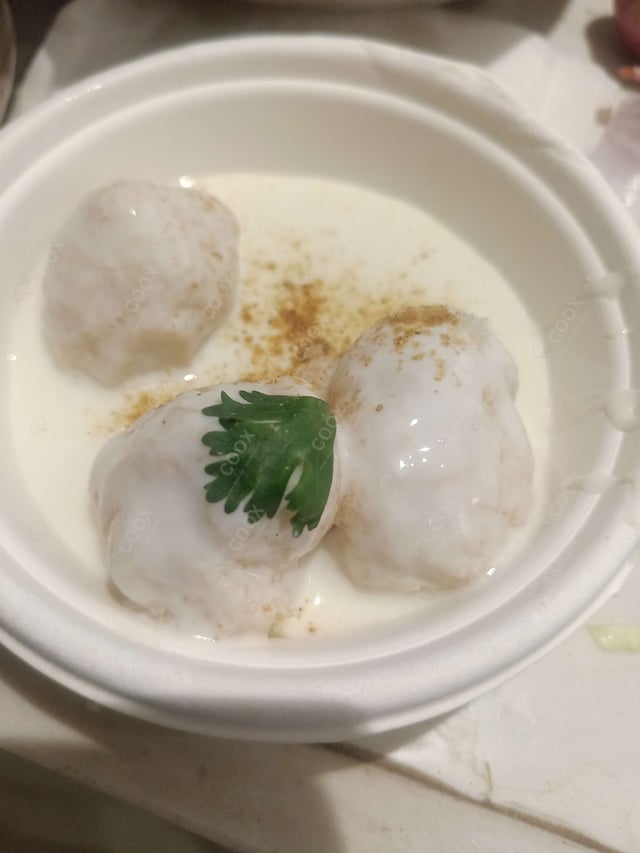 Delicious Dahi Bhalla prepared by COOX