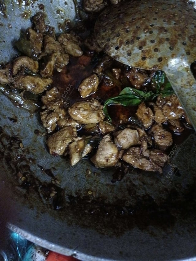 Delicious Thai Basil Chicken prepared by COOX