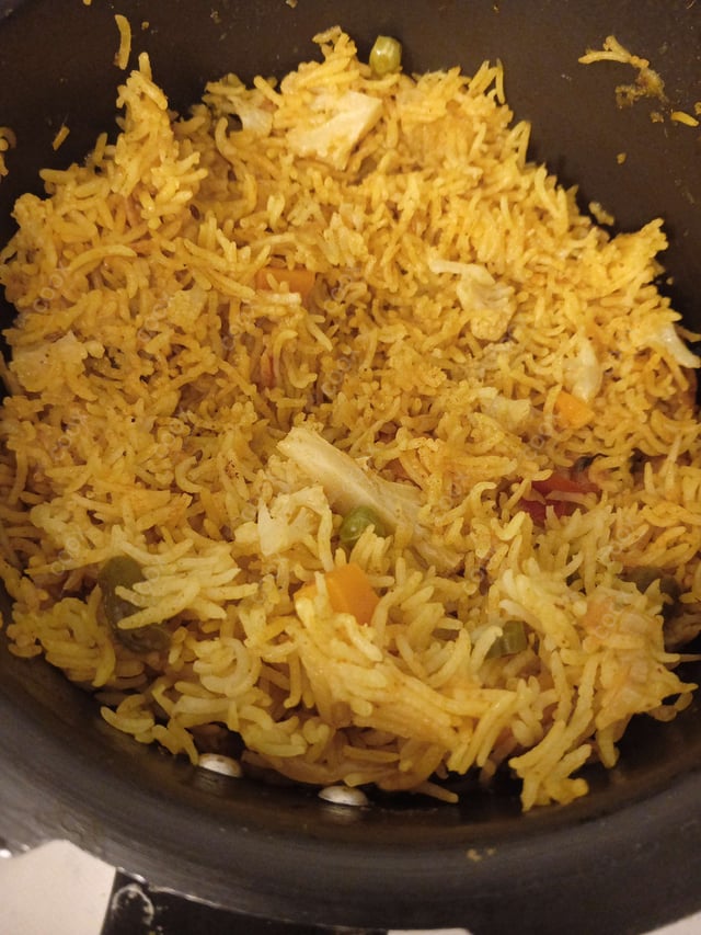 Delicious Veg Biryani prepared by COOX