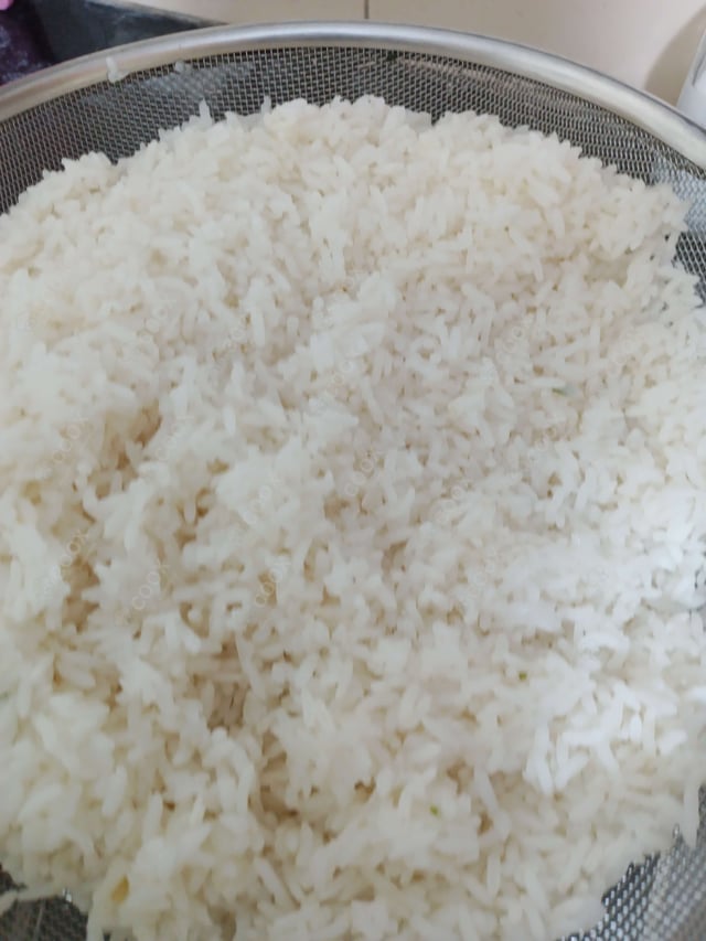 Delicious Steamed Rice prepared by COOX