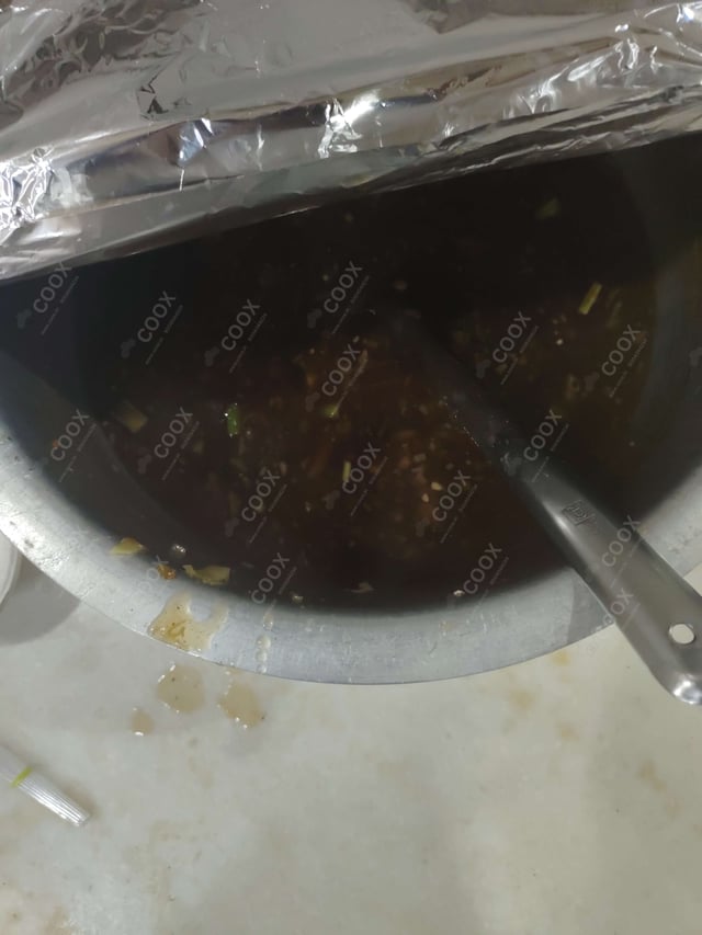 Delicious Vegetable Manchow Soup prepared by COOX