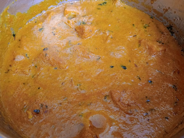 Delicious Stuffed Potatoes (Gravy) prepared by COOX