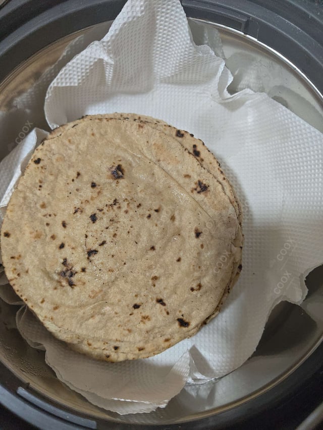 Delicious Tawa Rotis prepared by COOX