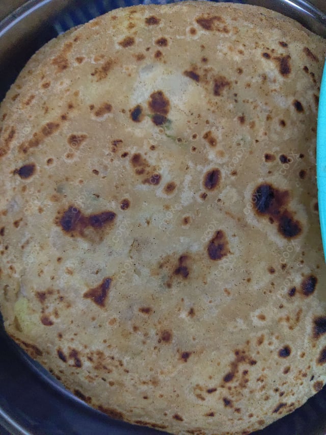 Delicious Stuffed Paranthas prepared by COOX