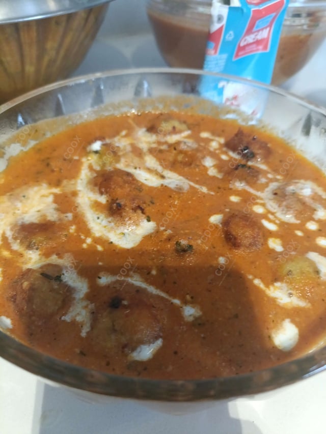 Delicious Malai Kofta (Orange Gravy) prepared by COOX
