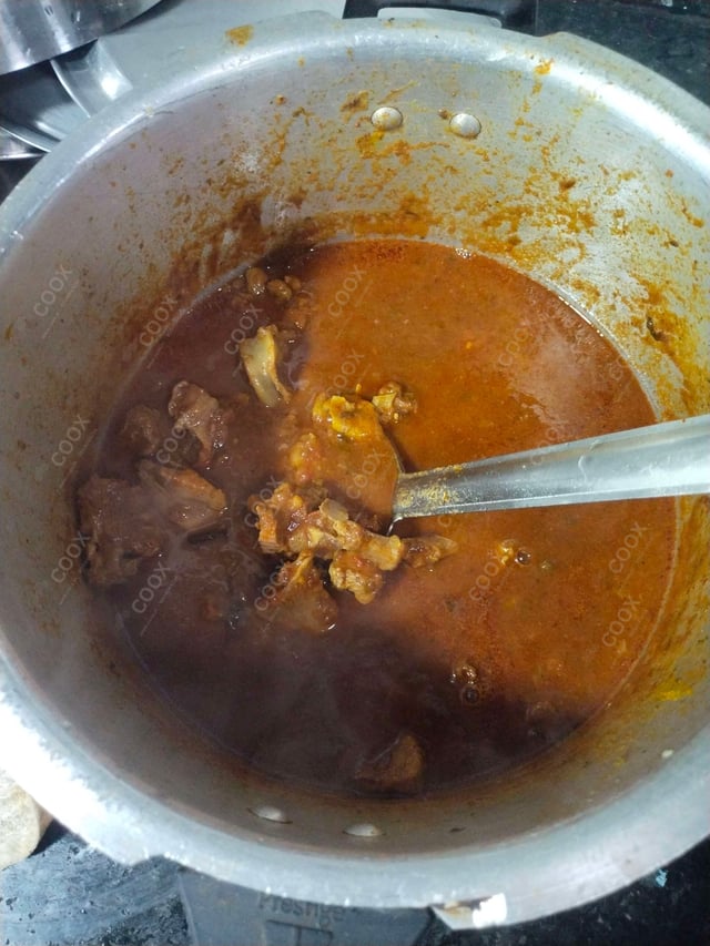 Delicious Mutton Rogan Josh prepared by COOX