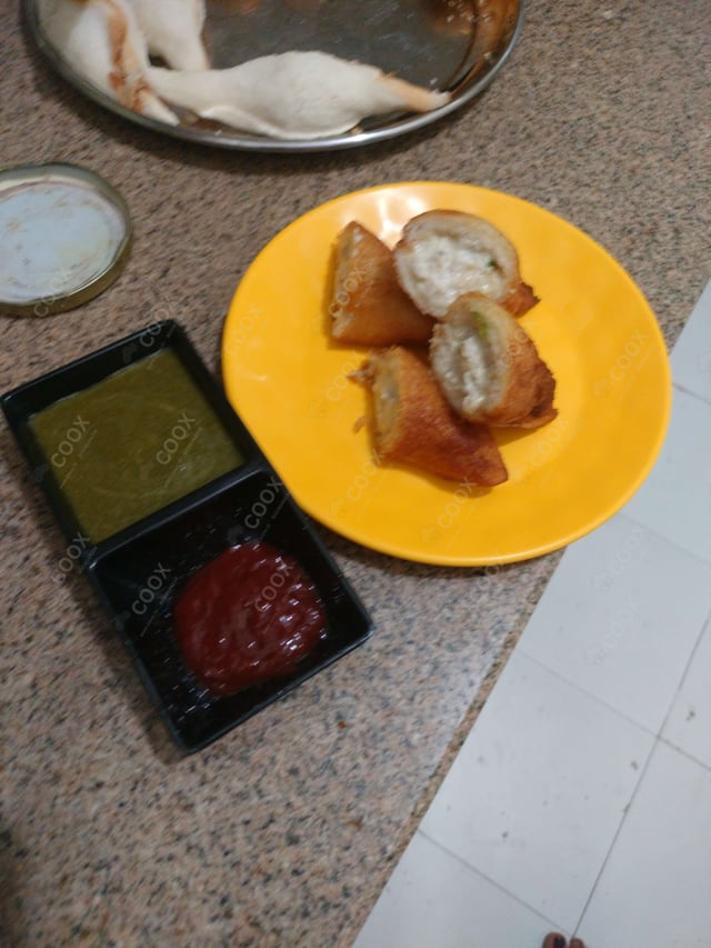 Delicious Dahi ke Sholey prepared by COOX