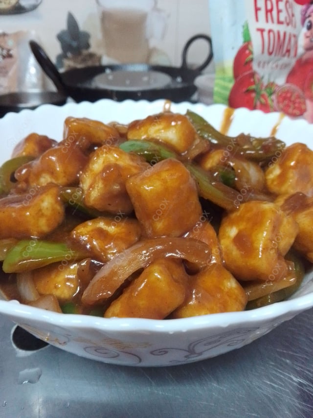 Delicious Chilli Paneer (Dry) prepared by COOX
