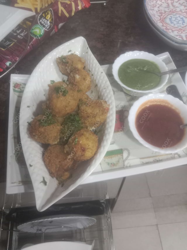 Delicious Fried Cheese Balls prepared by COOX