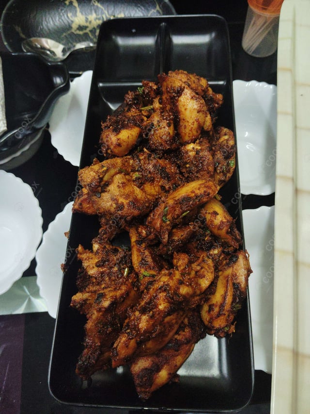 Delicious Chicken Tikka prepared by COOX