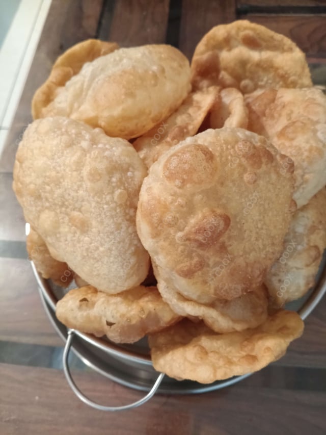 Delicious Pooris & Bedmis prepared by COOX