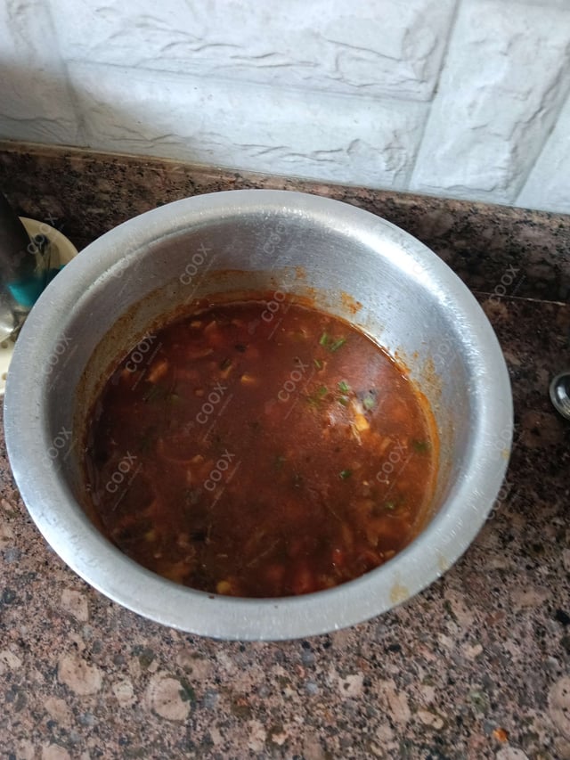 Delicious Vegetable Manchow Soup prepared by COOX