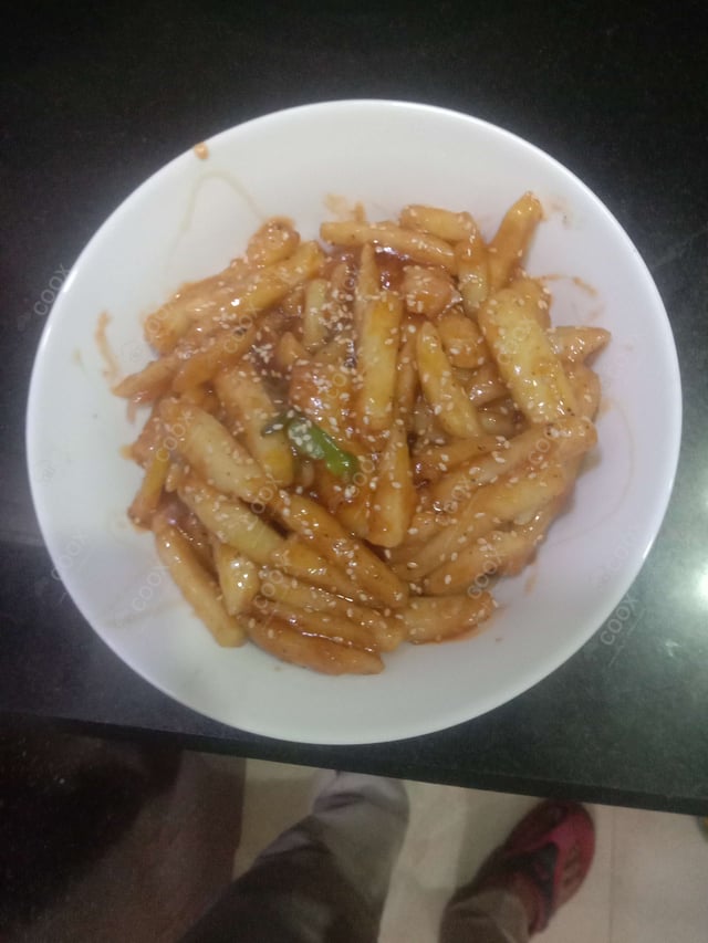 Delicious Honey Chilli Potato prepared by COOX