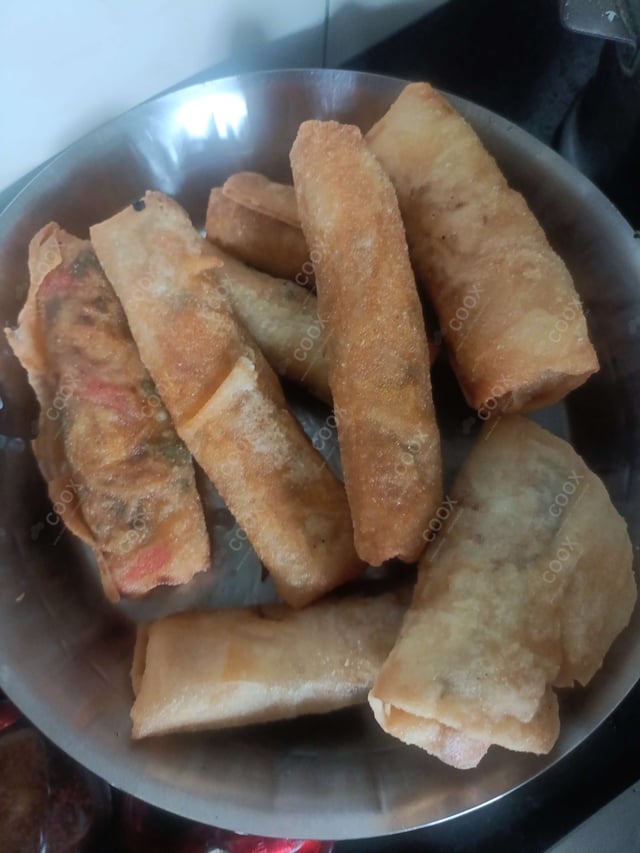 Delicious Veg Spring Rolls prepared by COOX