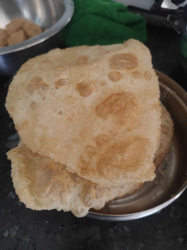 Delicious Chana Bhatura prepared by COOX