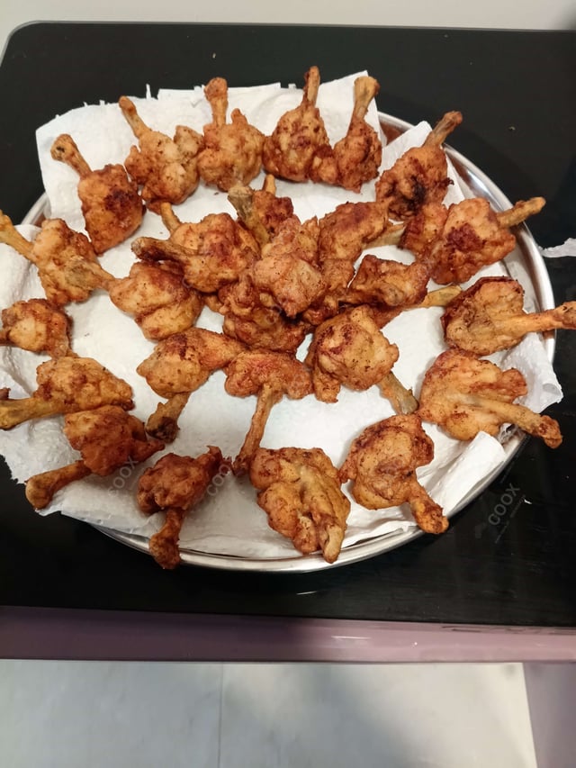 Delicious Chicken Lollipop prepared by COOX