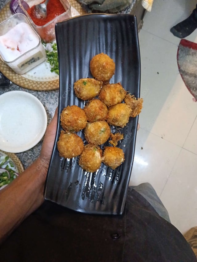Delicious Fried Cheese Balls prepared by COOX
