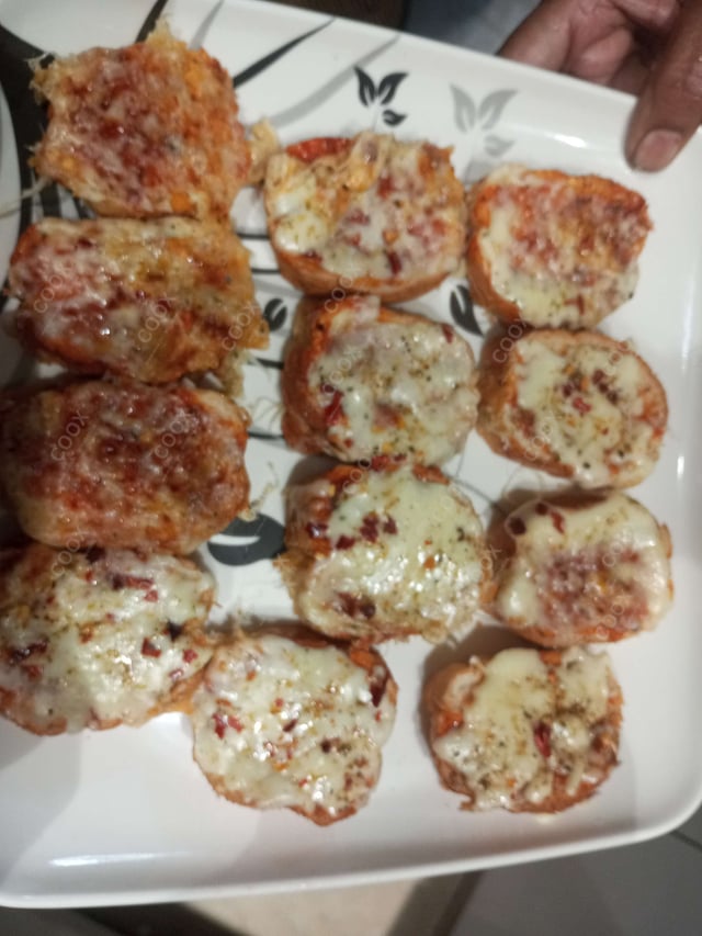 Delicious Garlic Bread with Cheese prepared by COOX