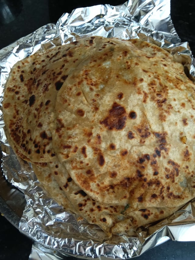 Delicious Stuffed Paranthas prepared by COOX