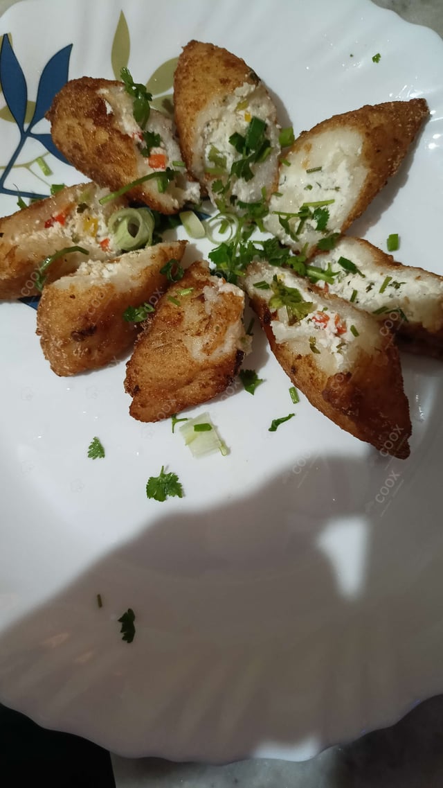 Delicious Dahi ke Sholey prepared by COOX