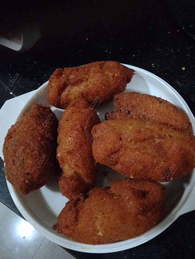 Delicious Dahi ke Sholey prepared by COOX