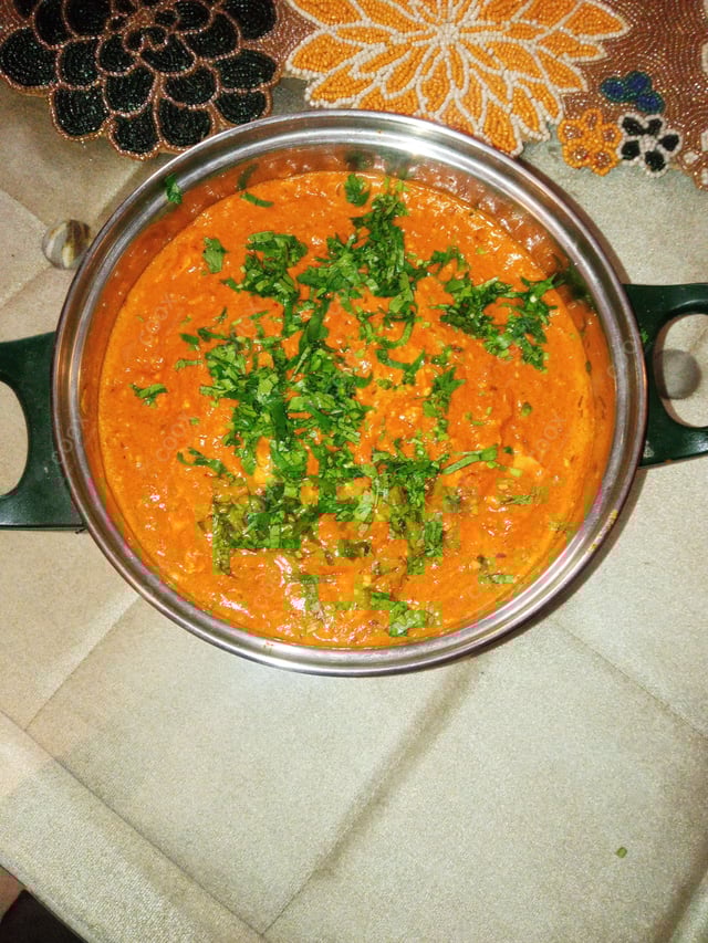 Delicious Paneer Butter Masala prepared by COOX