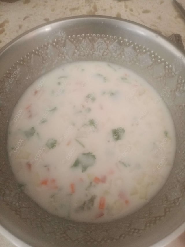 Delicious Mix Veg Raita prepared by COOX