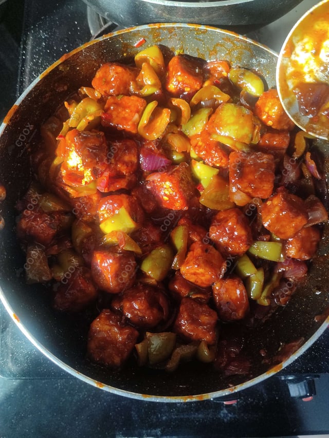 Delicious Chilli Paneer (Dry) prepared by COOX