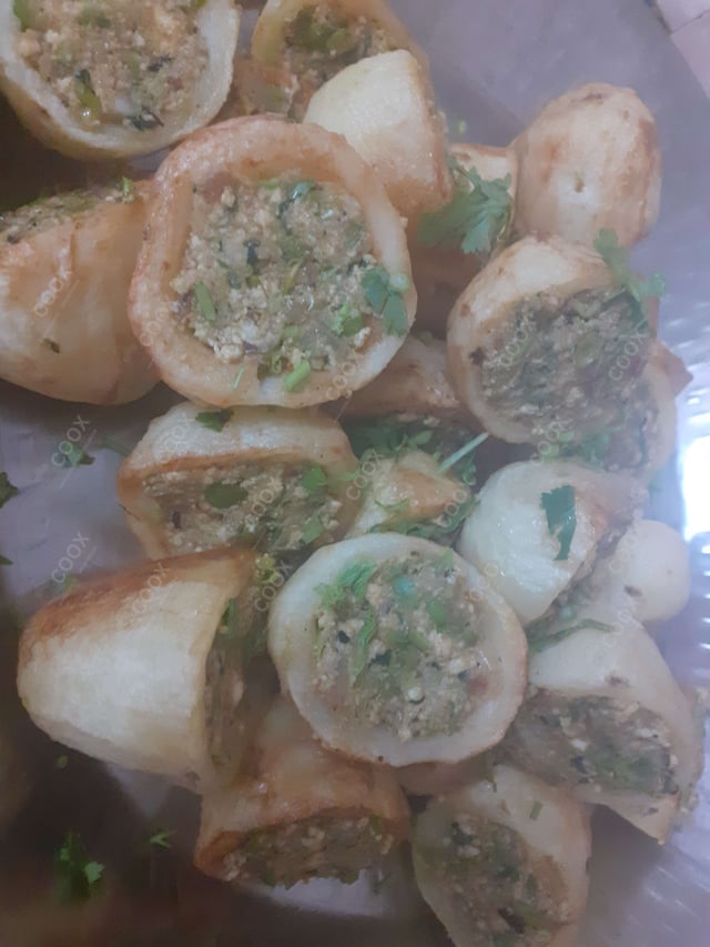 Delicious Stuffed Potatoes (Gravy) prepared by COOX